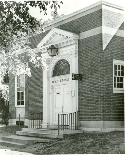 black and white photo of the library entrance