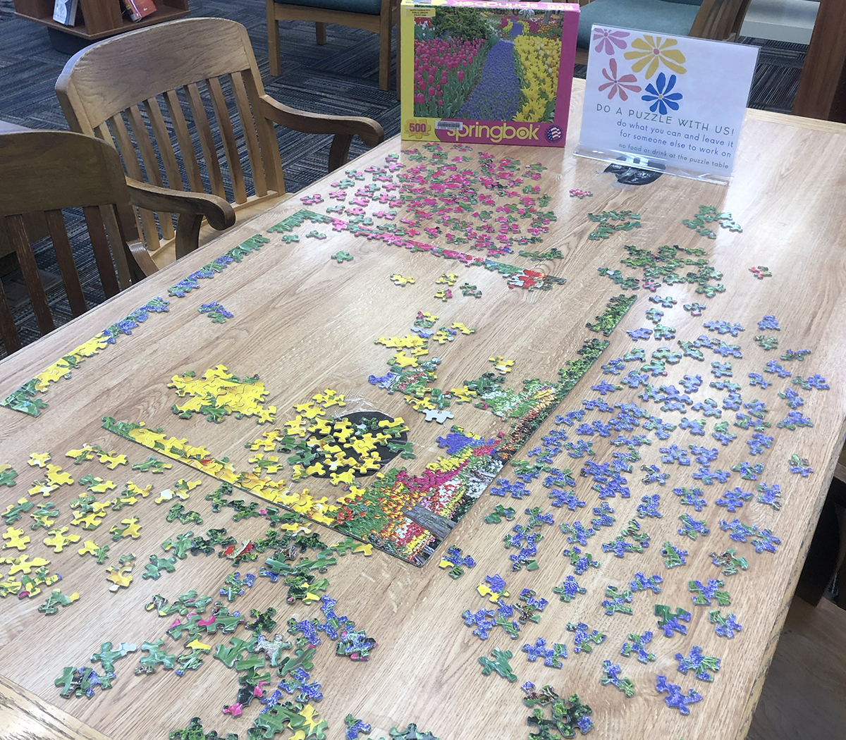 Puzzle pieces spread out on a table